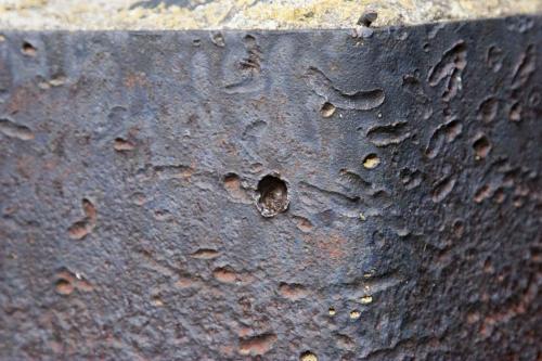 Traces of large-caliber bullets on the bunker #210